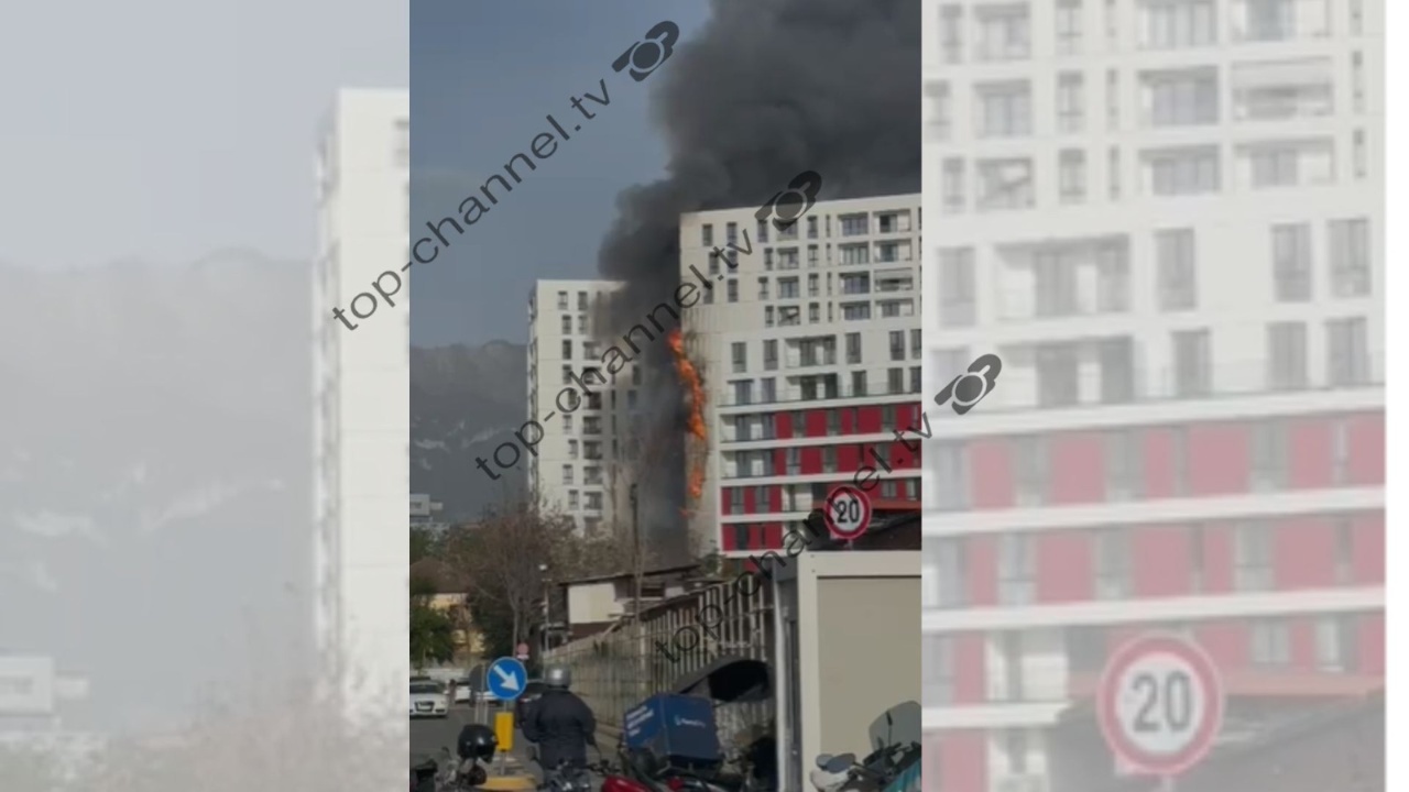 Zjarr në kompleksin e banimit përballë  Nënë Terezës   flakët përfshijnë fasadën e jashtme të pallatit  zjarrfikëset në vendngjarje